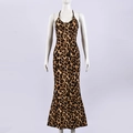 Detail of the leopard print pattern and halter neckline on a slim fit maxi dress - S / Brown