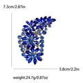 Spilla fiore vintage con strass blu e finitura dorata con dettagli su peso e misura - Blu