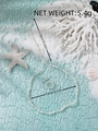Detail view of pearl anklet and toe ring set with dimensions and sea-themed props - White Pearl 2-Piece Set
