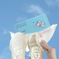 Blue individual shoe wipes cleaning white sneakers for athletic and leather footwear - Shoe Cleaning Style / Blue