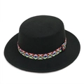Close-up of a black flat-top wool felt hat featuring a colorful geometric embroidery band - One Size / Black