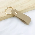 Minimalist beige PU leather keychain pendant with golden metal ring and rivet detail - No.12 Khaki