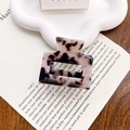 Pink tortoiseshell square acetate hair claw clip on decorative cloud tray and paper - Gray Tortoise