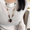 Collana lunga etnica vintage con ciondolo a ghianda e perline in pietra e legno pregiato - Marrone
