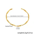 Detailed view of gold stainless steel knot bangle with 6cm inner diameter measurements - One Size / Minimalist Twisted Style (Z305) / Gold