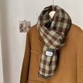 Maillard green and brown plaid scarf with black edges paired with a brown wool coat - Dark Green Checked With Hem