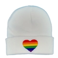White knit beanie hat with rainbow heart embroidery in a professional flat lay view - White
