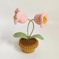 Handmade crochet potted pink flowers with green leaves in a brown yarn base - Lily of the Valley Potted Plant Finished