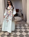 Detail of floral printed maxi dress with V-neckline and long lantern sleeves on model - S / Multicolor Floral