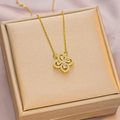 Elegant gold titanium steel necklace with a zircon clover pendant on a gift box - 6047 Hollow Clover / Gold White Zircon
