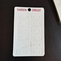 White cardboard jewelry display card with 12 pairs of earring holes for fashion accessories - Purple Text (7.5x12cm)