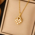 Elegant gold titanium necklace with hollow heart pendant featuring pearls and tiny crystals - Gold Heart Hollow Pearl Inlaid Necklace (JM2095)