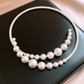 Collana di perle vintage francese a due strati con distanziatori dorati su pelle nera - Girocollo di perle