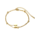 Double-layer golden stainless steel chain bracelet featuring round beads and an H-letter charm - Letter H