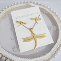 Golden stainless steel dragonfly necklace and earrings set on white display card - Set 2720 Gold Dragonfly