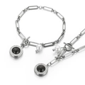 Silver stainless steel jewelry set with black round pendants and white pearls on white background - Steel Color Black Onyx Pendant Set (KS139450-Z)