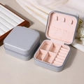 Portable silver PU jewelry travel case with pink lining and zipper closure - Gray