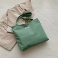 Grass green corduroy tote bag with fashion instinct label and long shoulder straps - Matcha Green