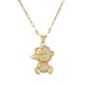 Golden bear pendant necklace with sparkling gems and COOL engraved hat on white background - White