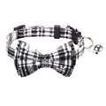 Detail of Christmas pet collar with black and white plaid bow and festive snowflake print - Christmas Black White Snowflake