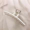 Detail of a large silver matte metal hair claw clip on soft textured fabric background - Matte Silver-Straight