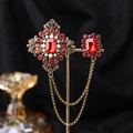 Detailed view of vintage Baroque brooch with red gems and pearls on a gold chain - TL0025-Red-Vintage
