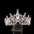 Detailed close-up of a silver bridal crown with rhinestones and oval center stone - Large V-Shaped Silver With White Rhinestone