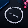 Minimalistische zilveren armband met ovale zirkonia en verstelbare verlengsluiting - Witgoud
