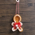 Handcrafted gingerbread man crochet ornament with red polka dot ribbon for Christmas tree - Gingerbread Man