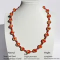 Handmade red glass beaded necklace with gold brass accents and crystal details - Handmade Lampwork Mid-length Necklace / Red Gold White Pattern