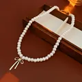 Collana di perle vintage francese con ciondolo a fiocco dorato lucido da donna - Collana di Perle con Fiocco (HN5240) / Perla Bianca Fiocco d'Oro