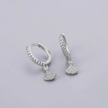 Detailed shot of silver hoop earrings featuring a sparkling pavé zircon fan pendant - Fan Shaped Earrings - Silver