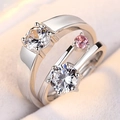 Paire de bagues couronne en argent avec zircons blancs et roses pour couple chic - Lueur des Étoiles