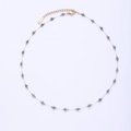 Close-up of golden stainless steel chain with faceted blue natural stone beads and clasp - Blue Facetted Beads
