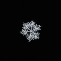 White iridescent glitter snowflake ornament with laser fiber filling on black background - 8cm 3 Pieces Per Pack