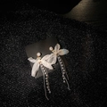 Detail of silk bow earrings with hanging pearls and golden fringe on a dark display card - White Bowknot Pearl Fine Chain Tassel Style (20# Silver Pin-Bowknot-Star)