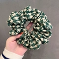 Classic green and white houndstooth cotton hair scrunchie shown in hand for scale - 12# Houndstooth Green