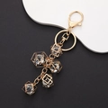 Golden keychain with crystal bead cage pendants and oil-dripped butterfly charms - Charm / K667 Rhombus Crystal Ball