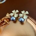 Elegant floral pearl earrings with white enamel petals and blue-grey metallic pearl drops - E4914 Silver Pin-Yellow-Gray