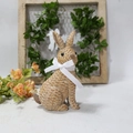 Detailed view of resin bunny with woven texture and white ribbon for garden decor - Brown Sitting Style