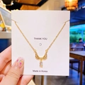 Collier élégant en acier titane doré avec pendentif aile en zircon et pierre goutte d'eau - Goutte Colorée Aile Or