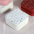 Portable square jewelry box in tweed fabric with gold zipper for travel storage - White