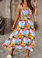 Detailed view of elastic pleated waist and vibrant floral print on a summer maxi dress - S / Yellow