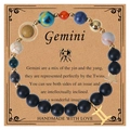 Gemini zodiac bracelet with black volcanic beads and star charm on gift card - Gemini