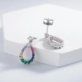 Teardrop hollow silver stud earrings with colorful zirconia stones on white pedestal - 925 Silver + Multi-color Cubic Zirconia / White Gold
