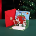 3D Pop-up Christmas card with red envelope featuring Santa, snowman and tomato house - Apple Hut / 12x12cm (Including Envelope/Sticker)