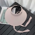 Women's light pink sun visor hat with long straps and wide brim on a textured surface - 14cm Ice Silk Visor / Pink
