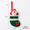 Calza di Natale verde con decoro Babbo Natale e specifiche delle dimensioni - Verde / 20g