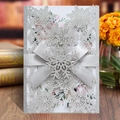 Silver laser-cut snowflake wedding invitation with glitter finish and elegant ribbon bow - Silver Full Set (Cover, Inner Page, Silver Bow, Snowflake, White Envelope)