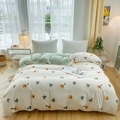 Floral cotton duvet cover in cream with orange fruit pattern and sage green lining - Persimmon Pattern